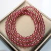 The 15-year-old store's White Jade crystal Pearl Treasure Strawberry Crystal 4mm with three rings Application Scenario